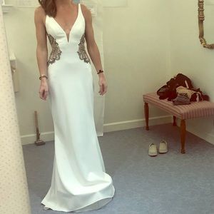 New Faviana long fitted dress, beautiful beading.